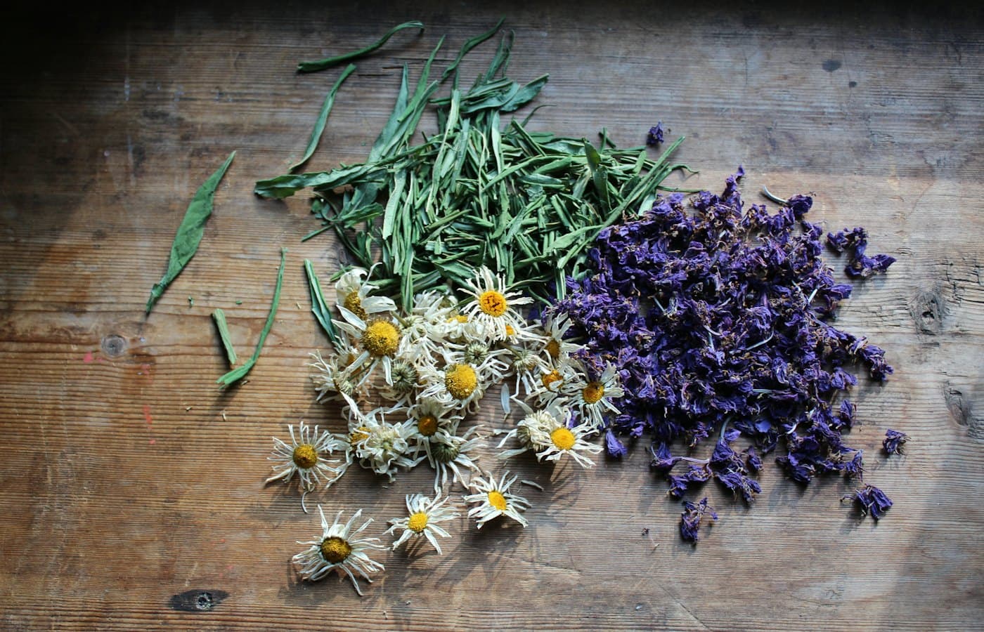 Assorted colored flowers on brown surface