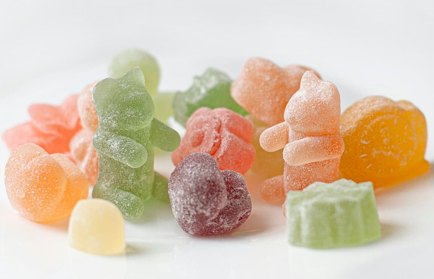 Orange green and pink candies