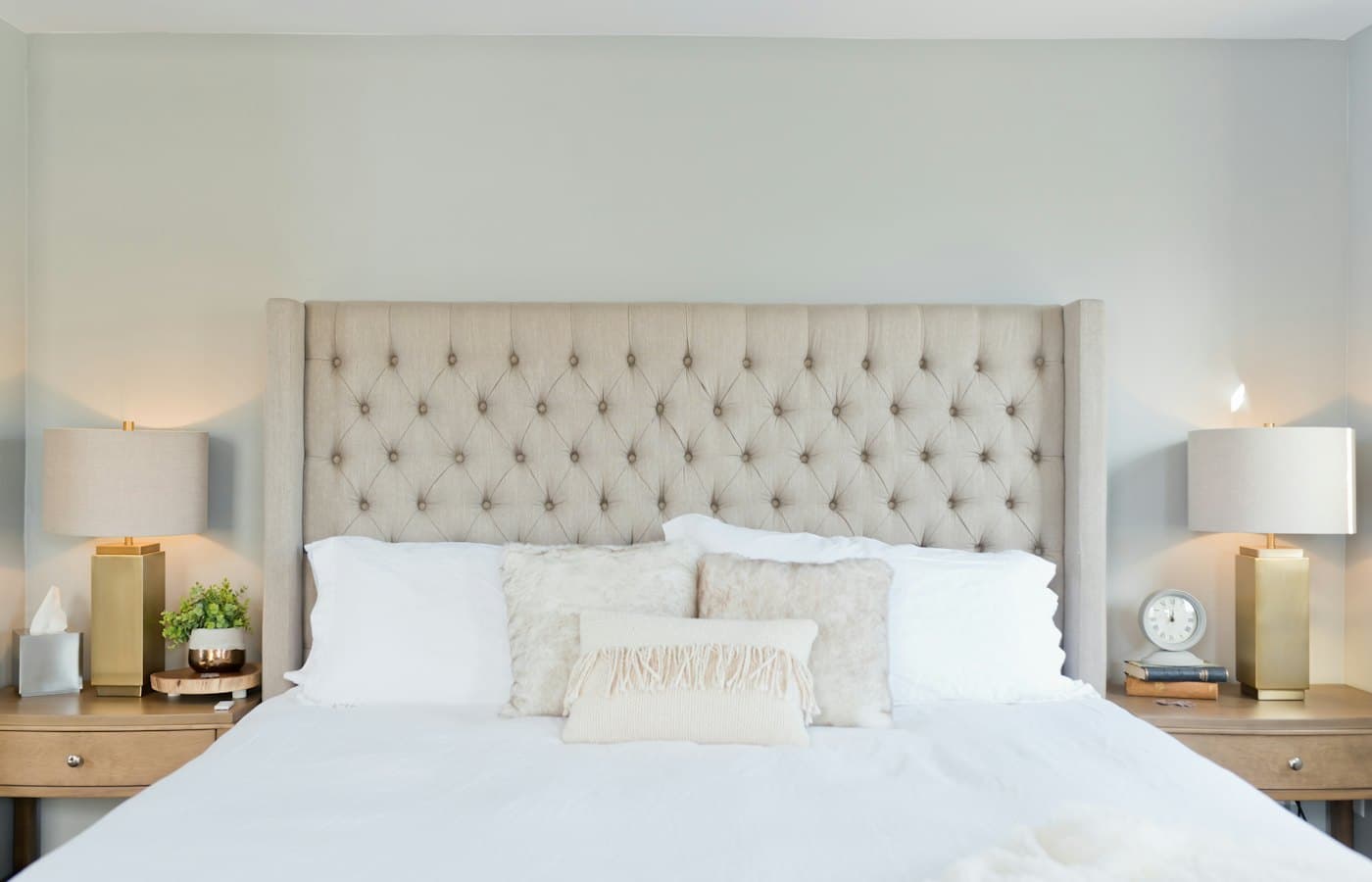 White bed linen with white pillows