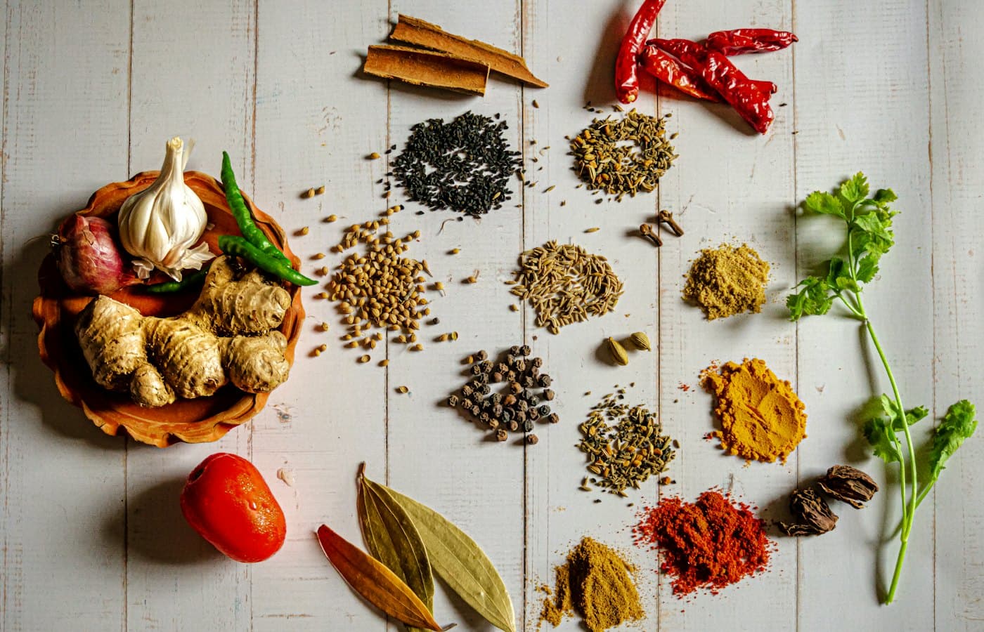 A variety of spices on a white table