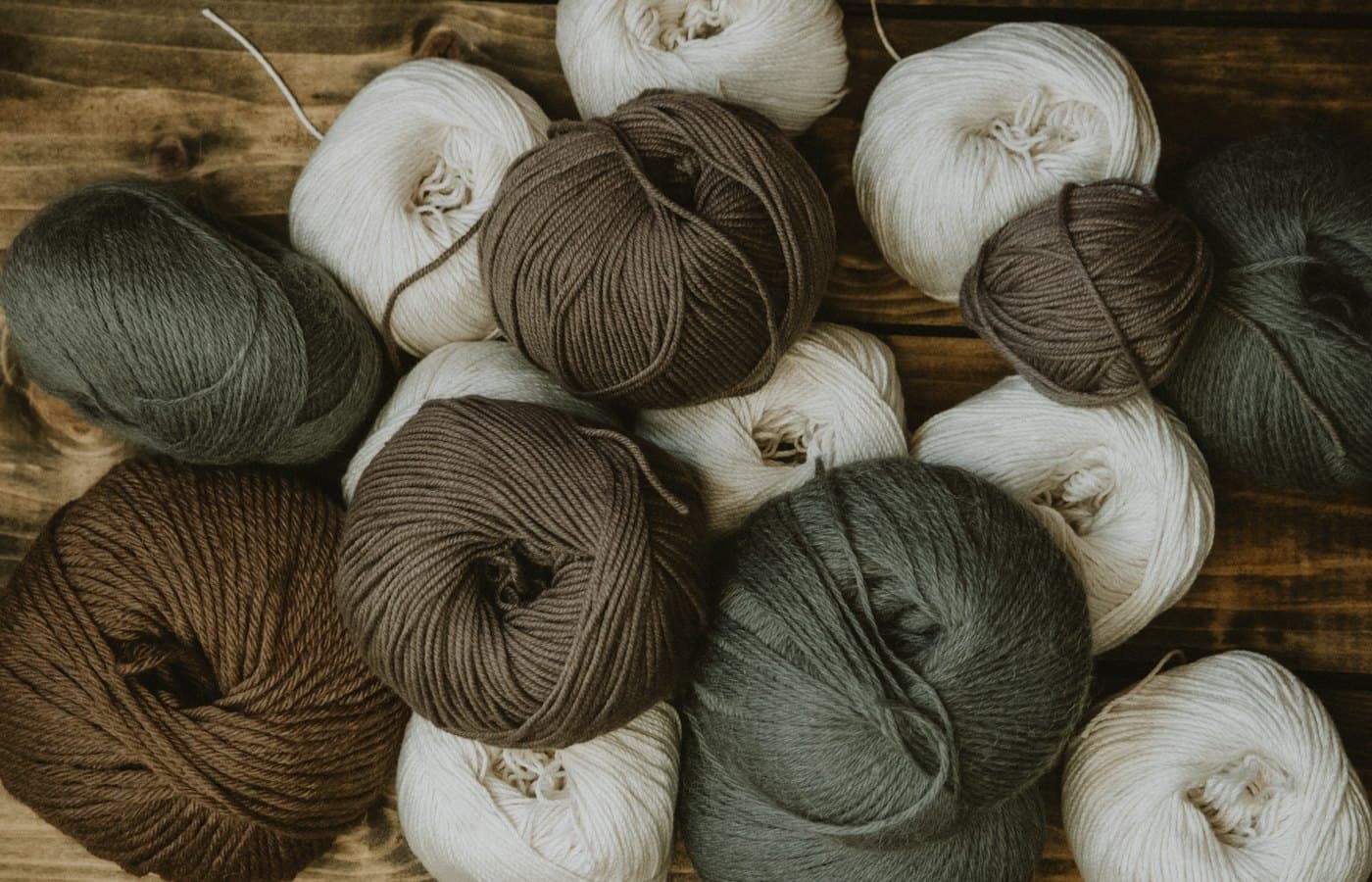 Brown and white yarn rolls