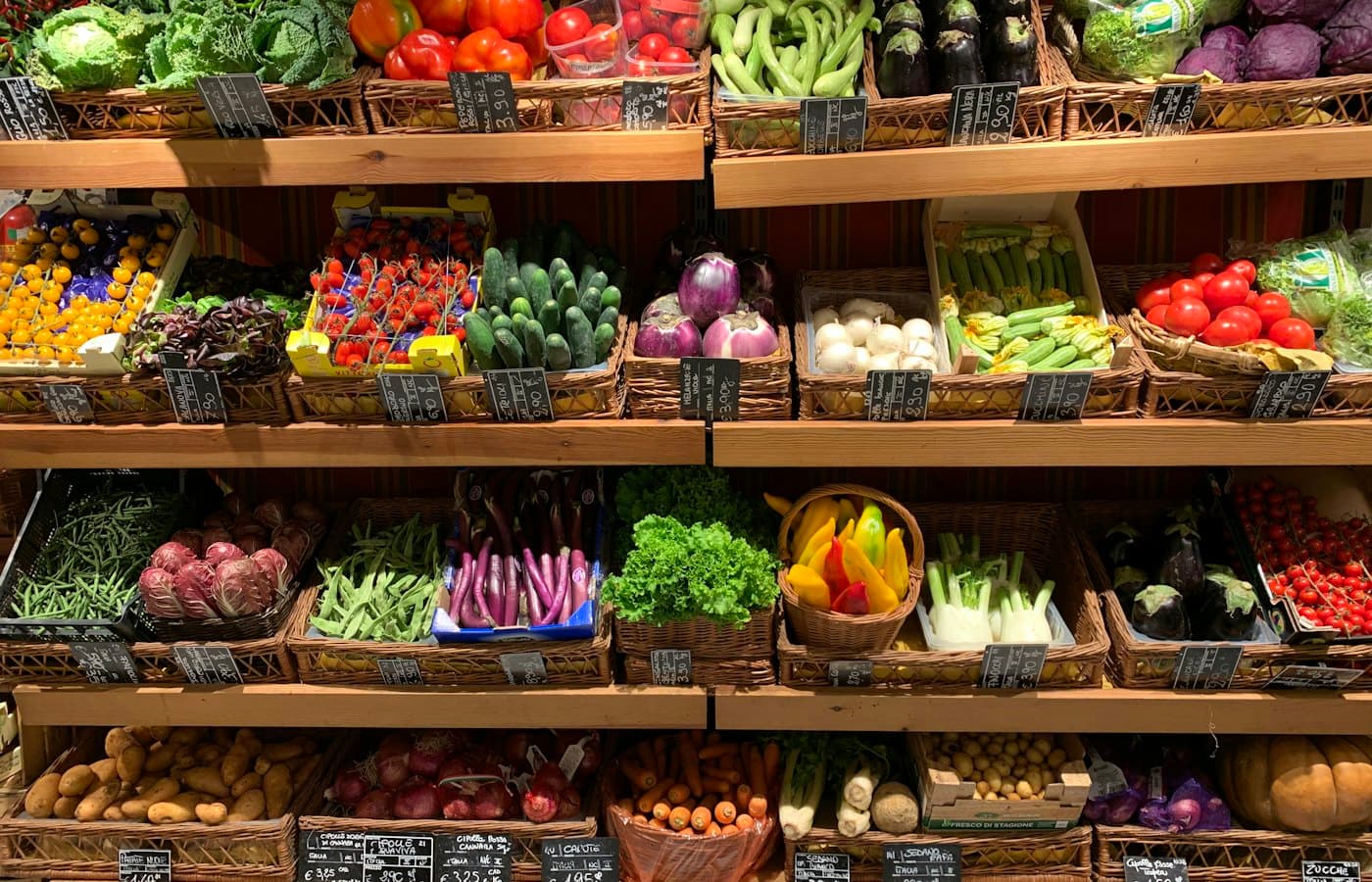 Assorted fruits on brown wooden rack