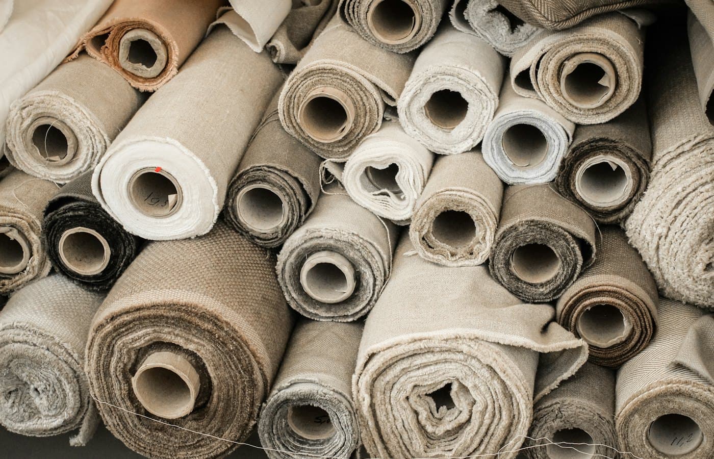 White rolled paper on brown wooden surface