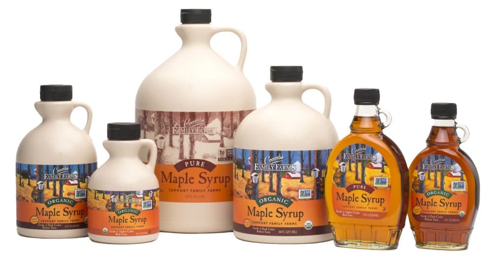 Coombs Family Farms maple syrup range: Organic Maple Syrup jugs and glass bottle alongside Pure Maple Syrup containers